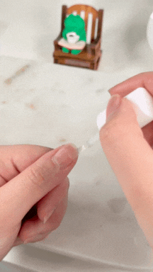 apply brush on glue on your nail